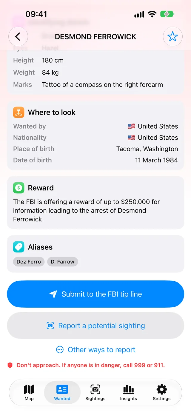 A sample FBI wanted notice for a fictional person, with physical description, where to look, reward and aliases, and a large “Submit to the FBI tip line” button above “Report a potential sighting”.